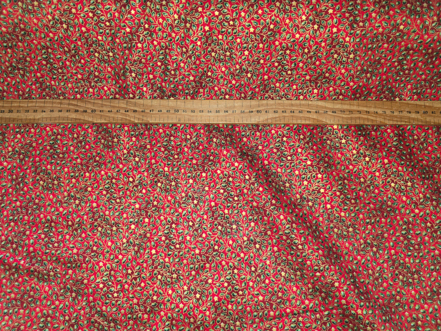 Christmas Cotton 135cm Tiny Holly Leaves on Red